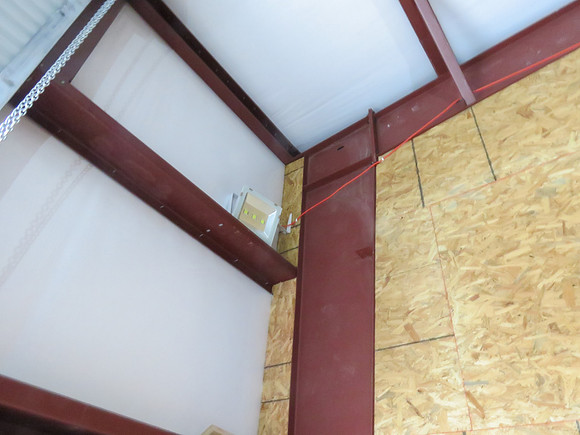 old LED lighting run above single entry door